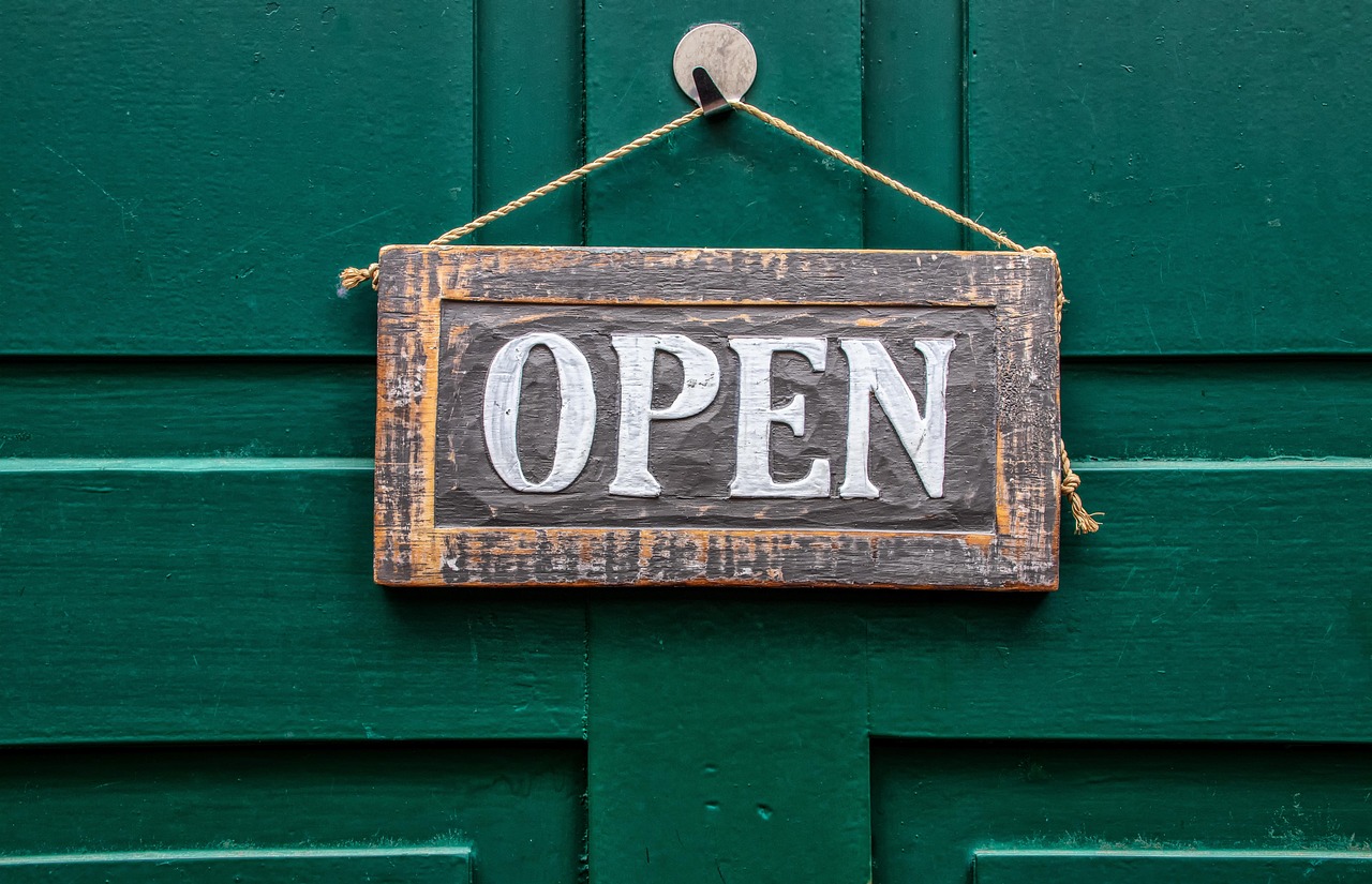Open sign in a storefront door